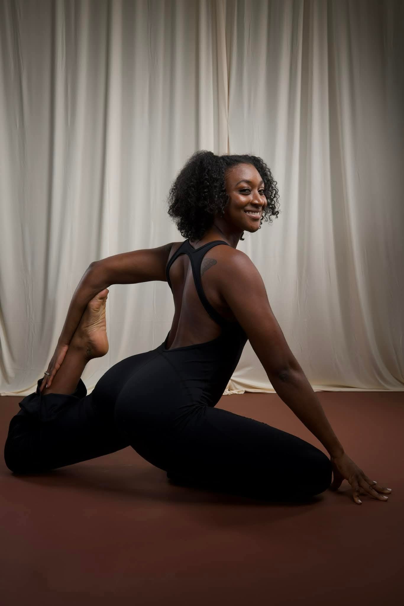 full body photo of yoga instructor Bria